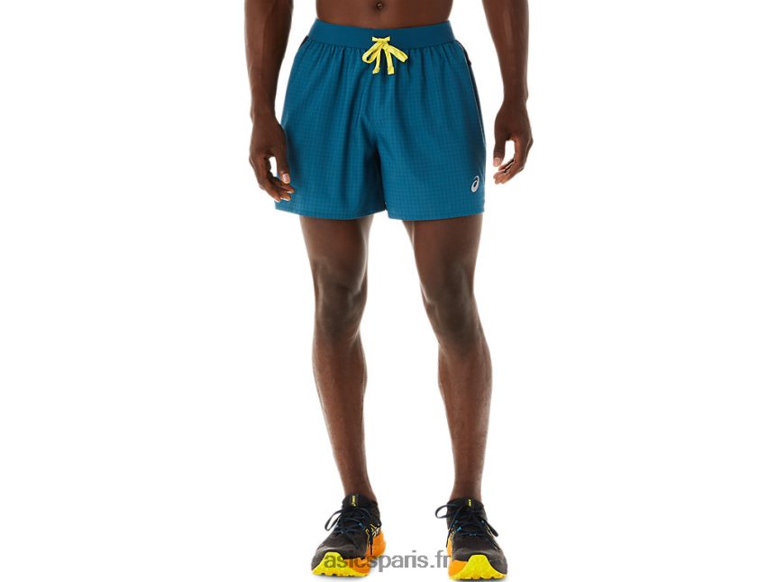Hommes Asics short logo fujitrail BXL8B2479 bleu sarcelle d'encre/jaune doré